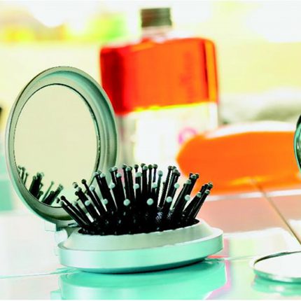 Brosse miroir pliable